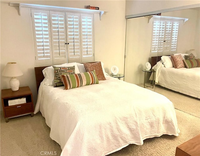 17 La Cerra Cir, Rancho Mirage, CA 92270 - carpeted bedroom with multiple windows and a closet