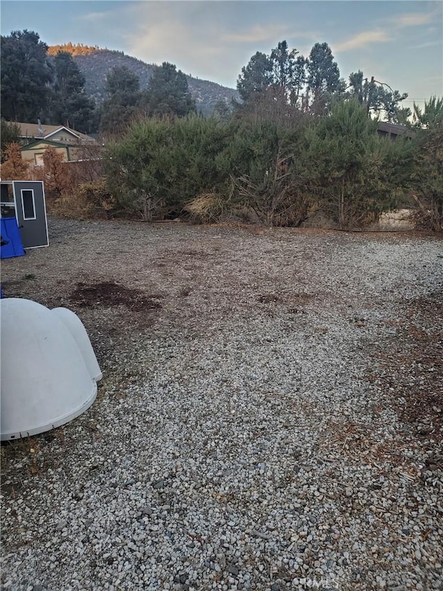 view of yard with a mountain view