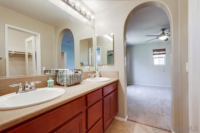 bathroom with vanity, tile patterned floors, and ceiling fan