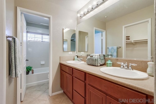 full bathroom with tile patterned flooring, vanity, toilet, and tub / shower combination