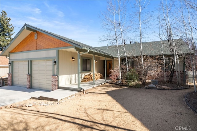 single story home featuring a garage