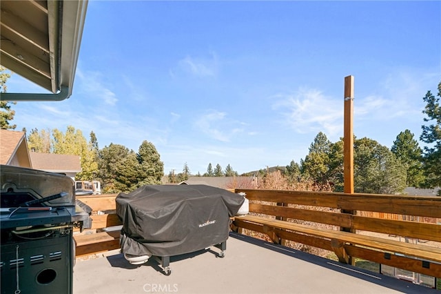 view of patio / terrace featuring grilling area and a deck