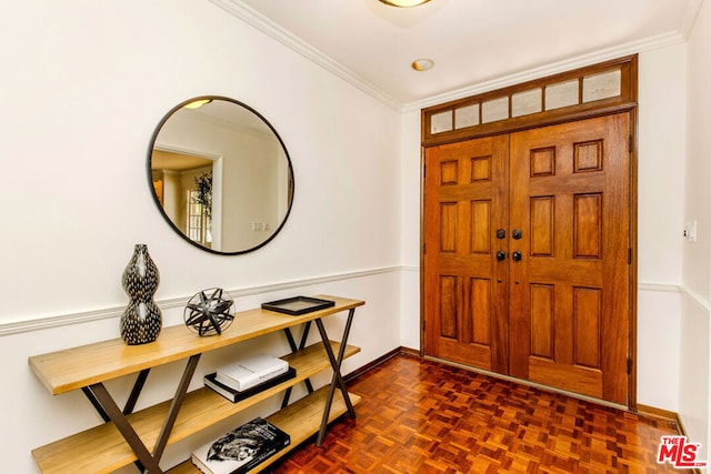 foyer featuring dark parquet floors and ornamental molding