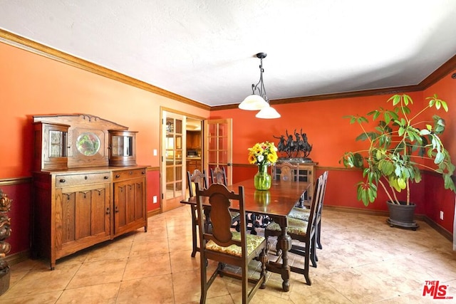 dining room with crown molding