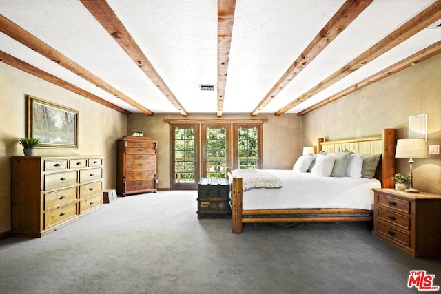 carpeted bedroom featuring beam ceiling, access to exterior, and a textured ceiling