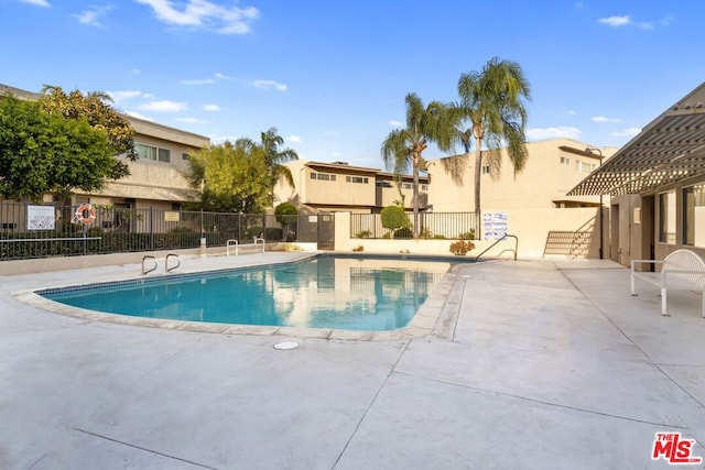 view of pool with a patio