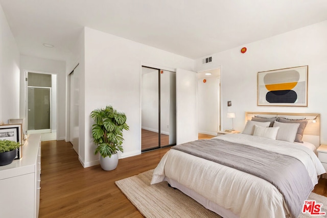 bedroom featuring hardwood / wood-style floors