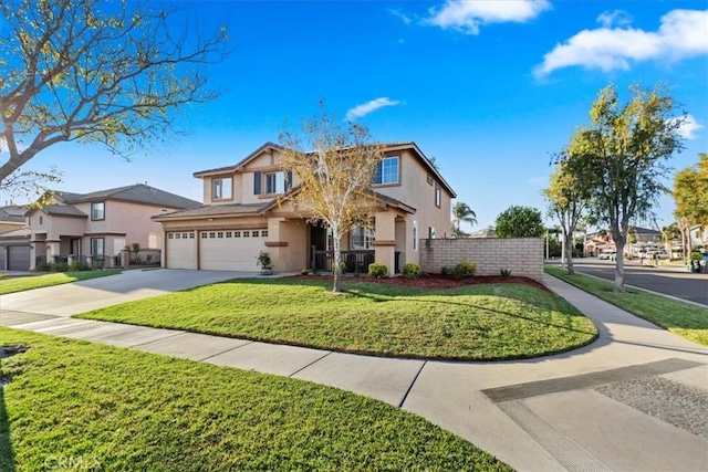 view of front facade with a garage and a front lawn