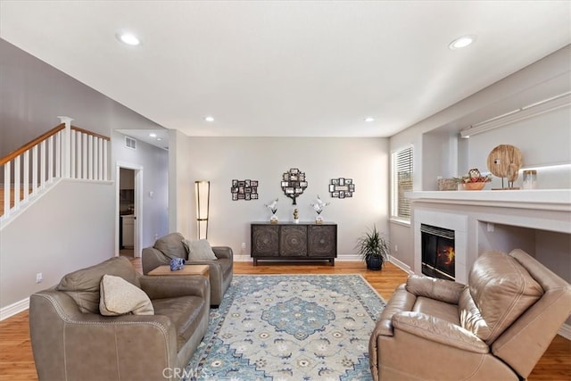 living room with light hardwood / wood-style floors