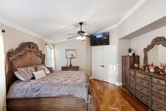 bedroom with wood-type flooring, ceiling fan, and crown molding