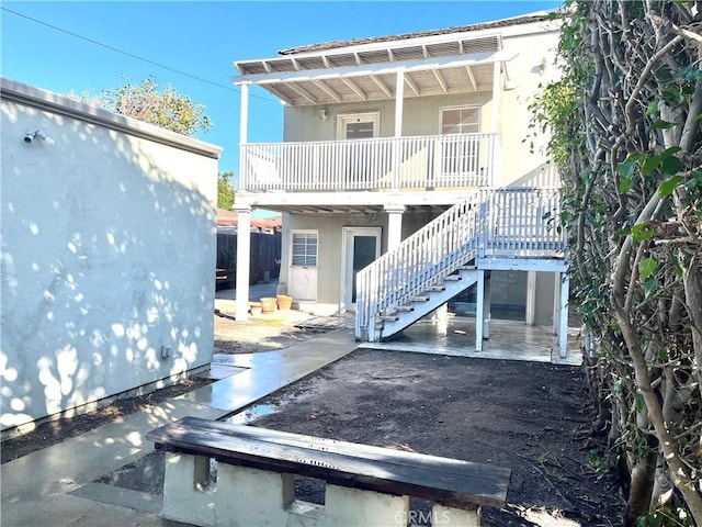 rear view of house featuring a patio area