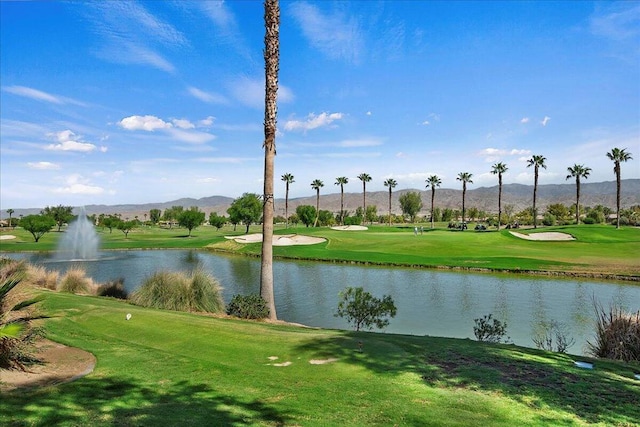 view of community featuring a water and mountain view