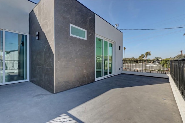 rear view of house with a patio