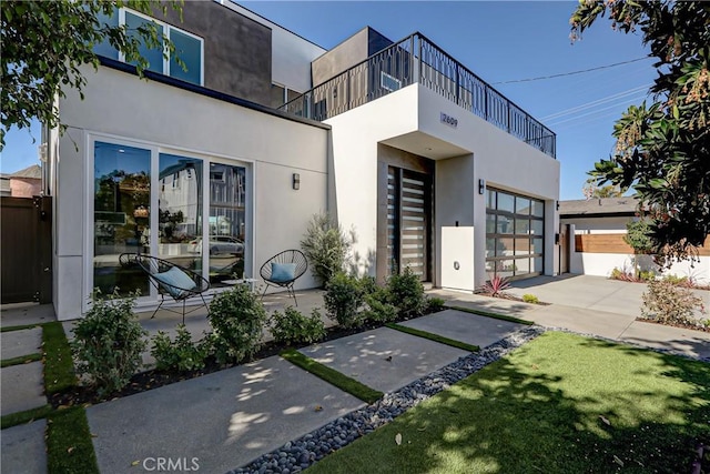 contemporary home featuring a patio