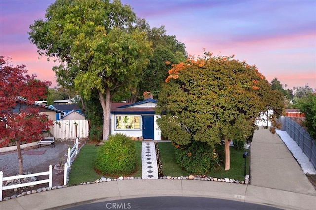 view of property hidden behind natural elements