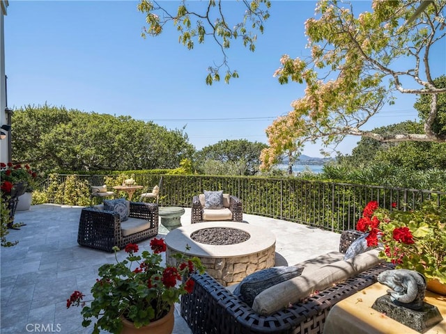 view of patio / terrace with a fire pit