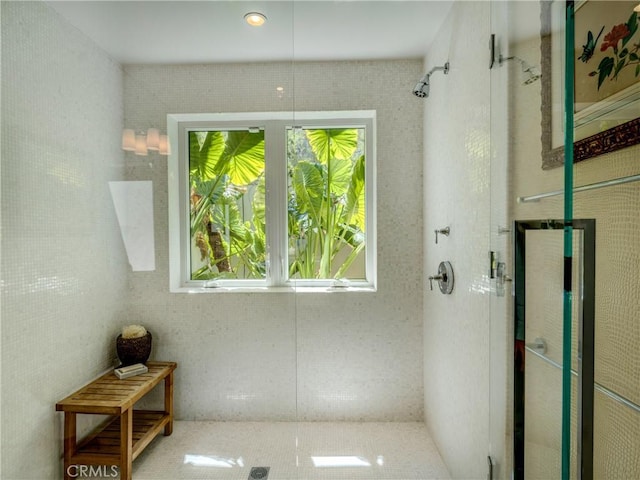 bathroom featuring tiled shower