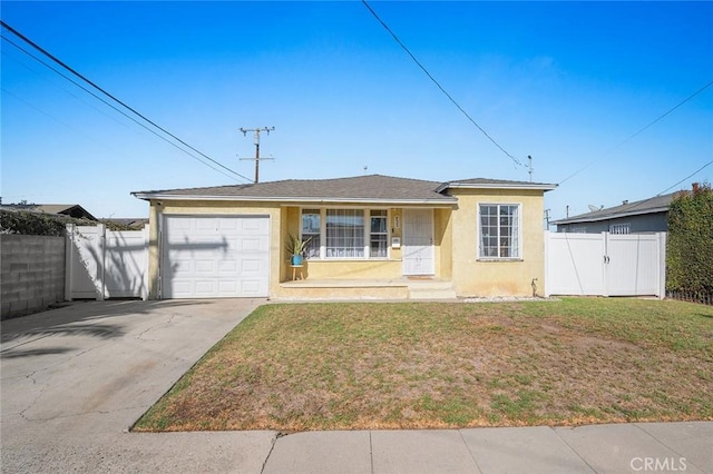 single story home featuring a front lawn and a garage