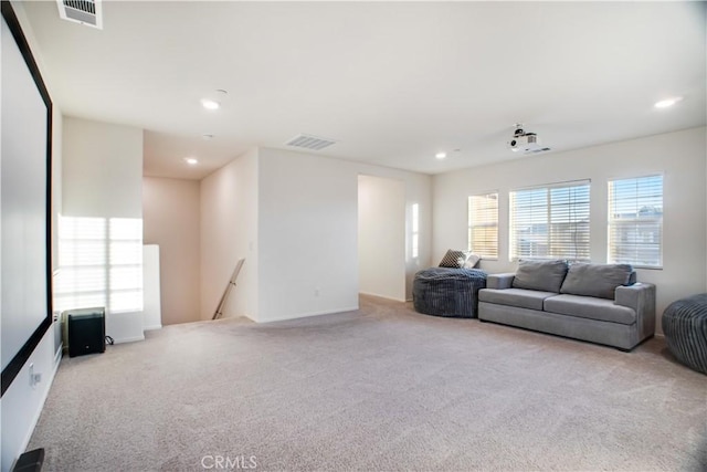 living room featuring light carpet