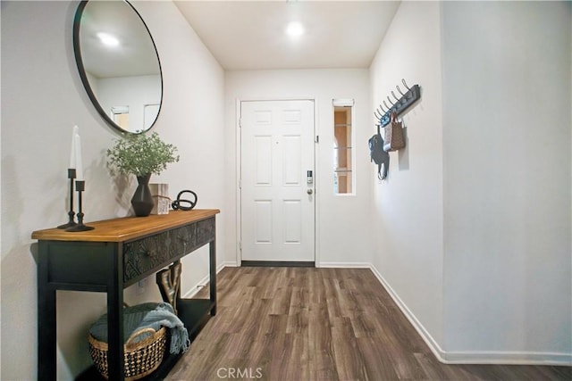 interior space with dark hardwood / wood-style flooring