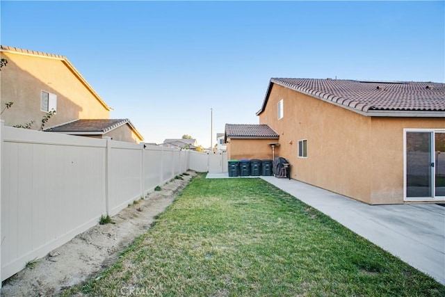 view of yard with a patio area