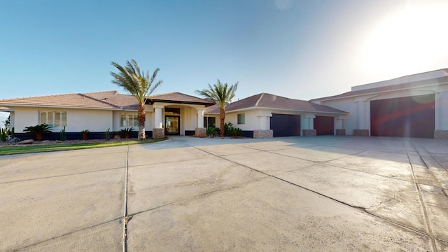 single story home with a garage