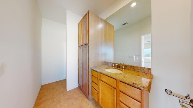 bathroom featuring vanity