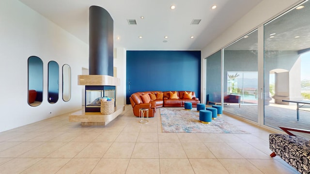 living room with light tile patterned floors