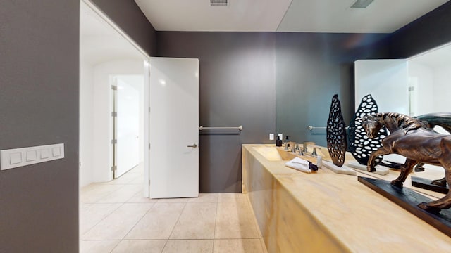 bathroom with tile patterned floors and sink