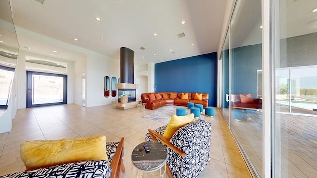 living room with light tile patterned floors