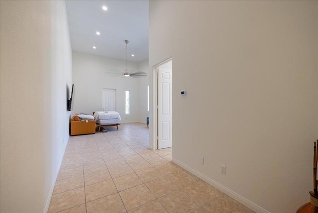 hall with light tile patterned flooring