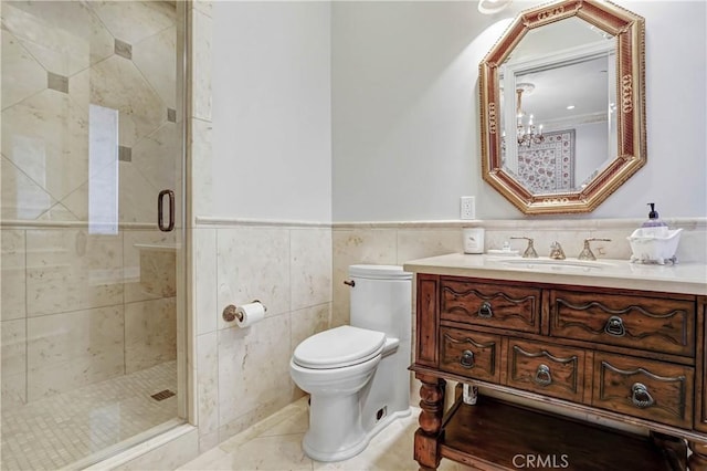 bathroom featuring vanity, tile patterned flooring, toilet, tile walls, and an enclosed shower