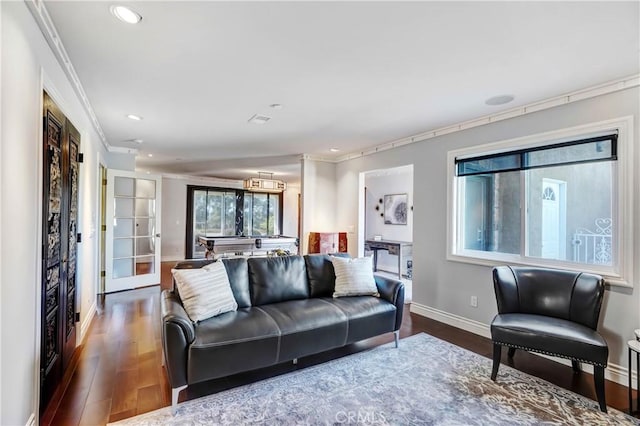 living room featuring french doors, dark hardwood / wood-style floors, crown molding, and billiards