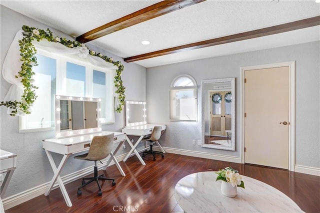 office with beamed ceiling and dark hardwood / wood-style floors