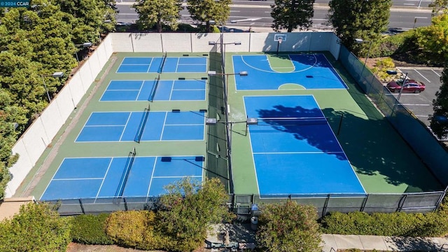 exterior space featuring basketball hoop