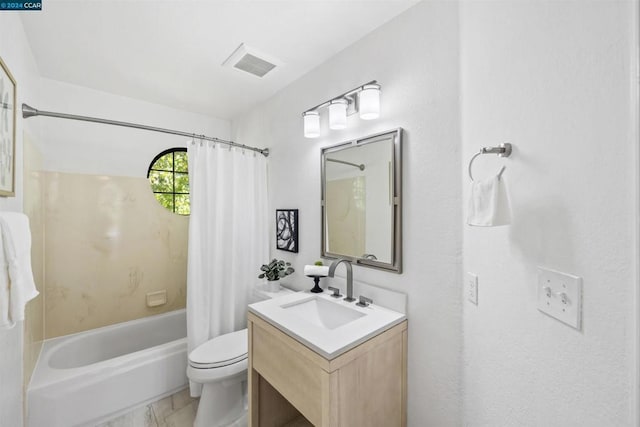 full bathroom with vanity, toilet, and shower / bath combo with shower curtain