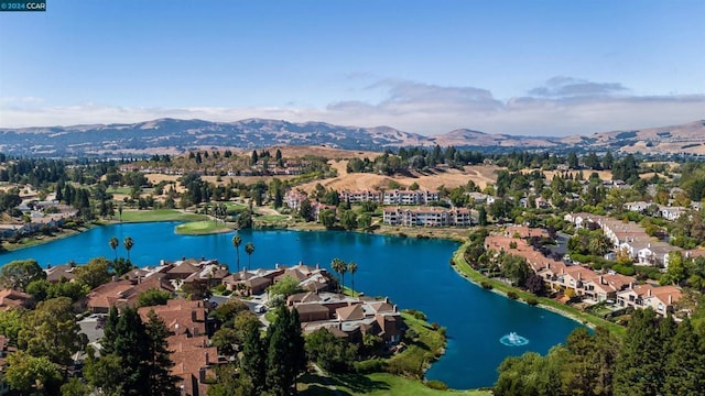 aerial view with a water and mountain view