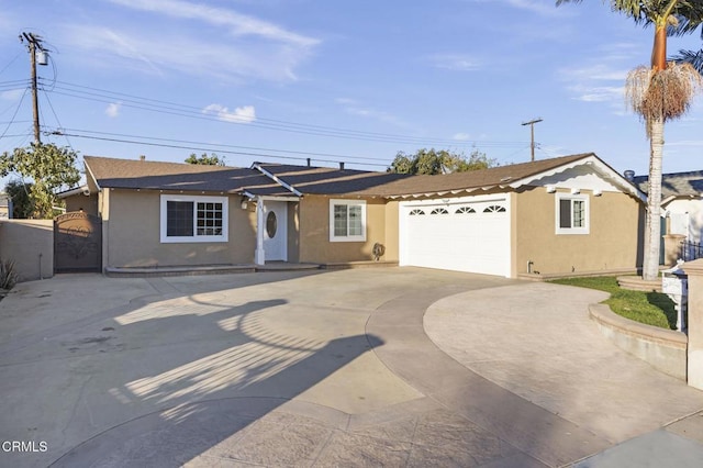 single story home featuring a garage