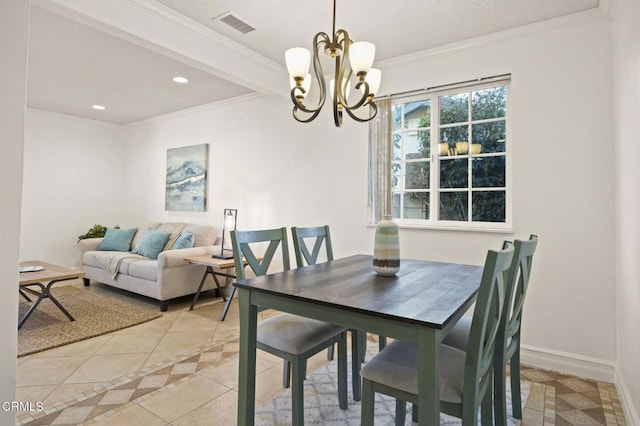 dining space with an inviting chandelier, ornamental molding, and light tile patterned flooring