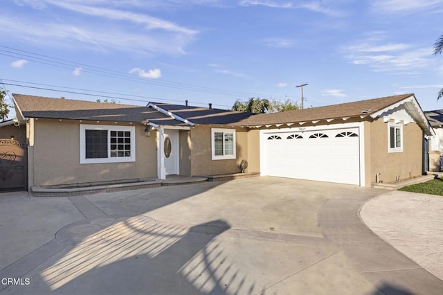 ranch-style house featuring a garage