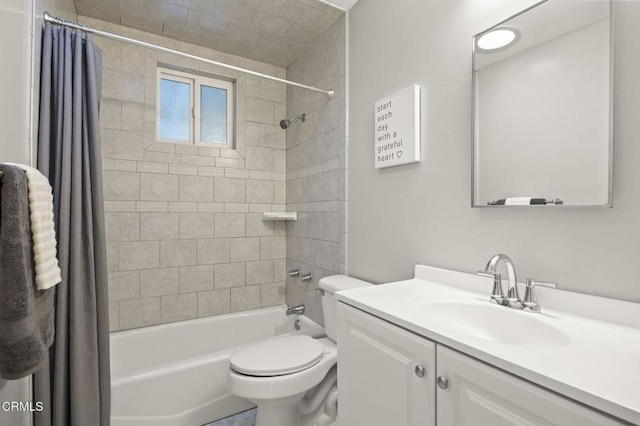 full bathroom featuring vanity, shower / bath combination with curtain, and toilet