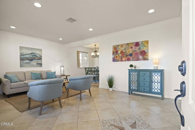 living room featuring a chandelier, light tile patterned floors, and crown molding