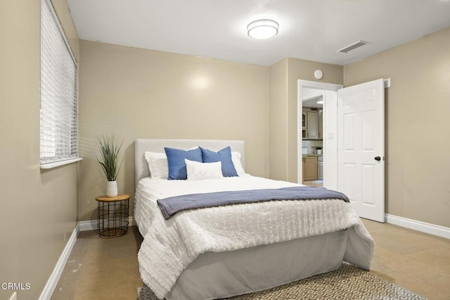 bedroom featuring tile patterned floors