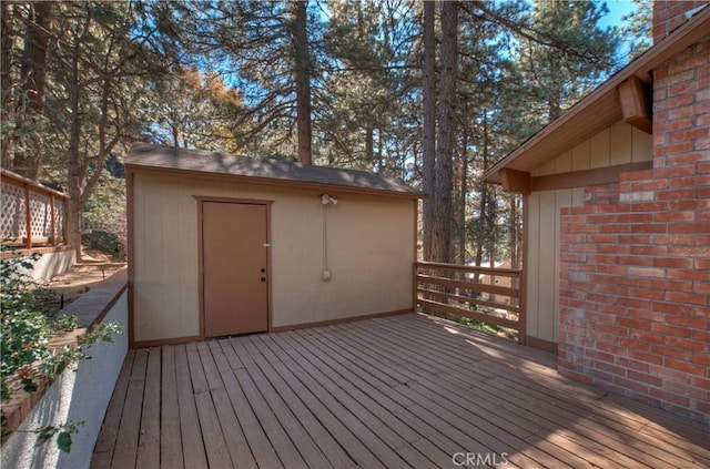 deck with a storage shed