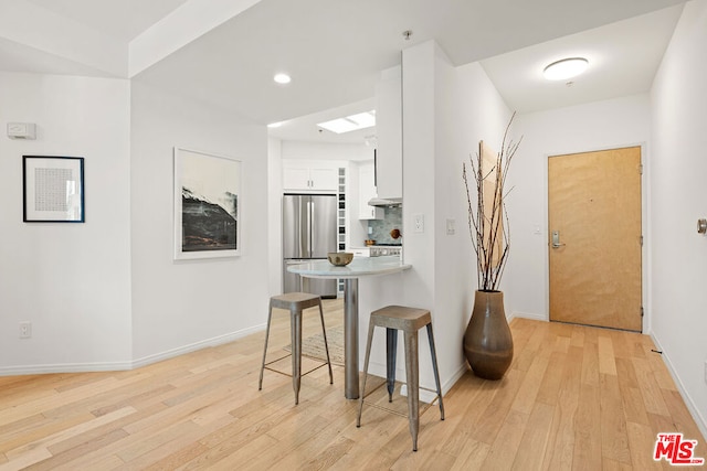 hallway featuring light hardwood / wood-style floors