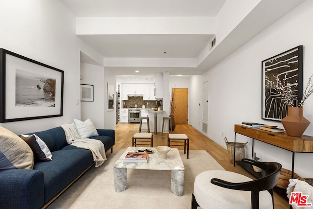 living room with light hardwood / wood-style floors