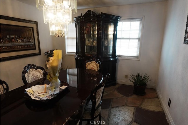 dining room with a chandelier