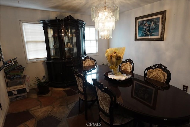 dining room with a chandelier