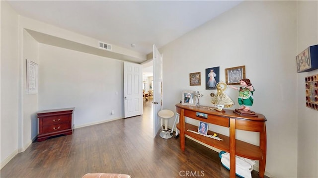 hall with dark hardwood / wood-style floors