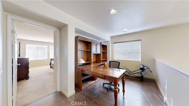 office space with wood-type flooring